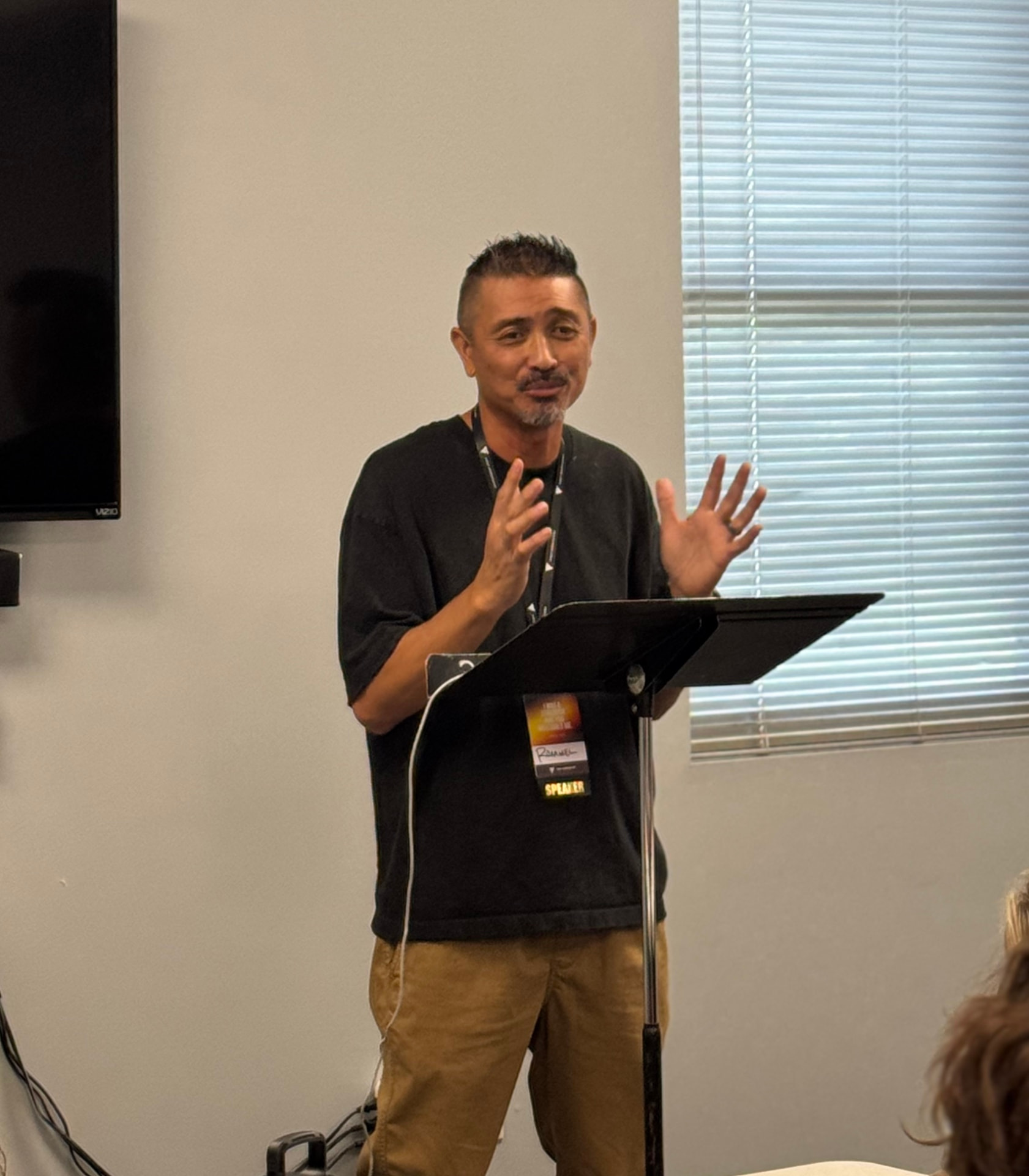 A speaker leading an implementation session